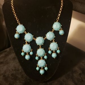 Turquoise colored bib necklace